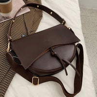 Sac bandoulière vintage en simili cuir avec pompon