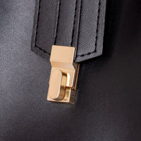 Sac bandoulière en simili cuir à fermoir métallique