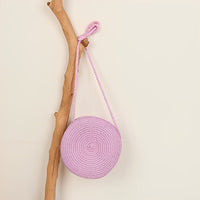 Petit sac rond en paille à bandoulière en corde