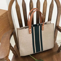 Sac cabas en toile texturée à anse en simili cuir