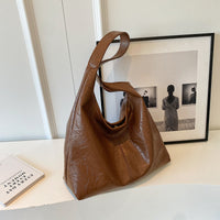 Sac hobo en simili cuir lisse avec pochette