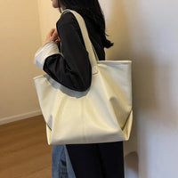 Sac cabas zippé en simili cuir
