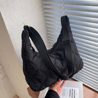 Sac bandoulière matelassé en nylon à motif losange