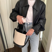 Sac seau en toile texturée à bandoulière réglable