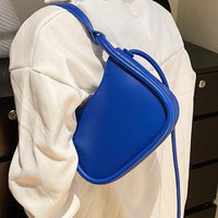 Petit sac bandoulière minimaliste en simili cuir