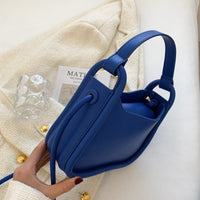 Petit sac bandoulière minimaliste en simili cuir