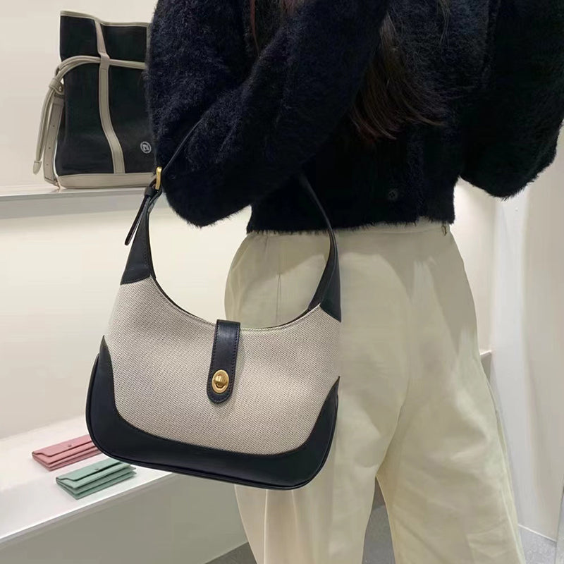 Petit sac à main en toile à fermoir tournant