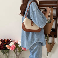 Petit sac à main en toile à fermoir tournant
