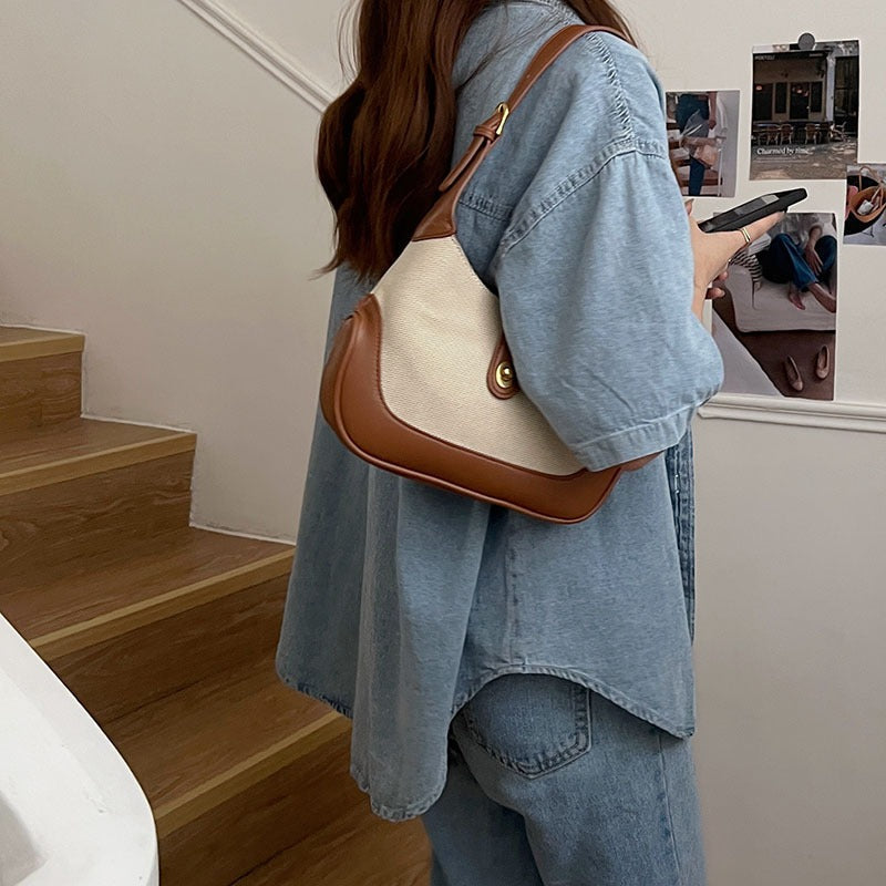 Petit sac à main en toile à fermoir tournant