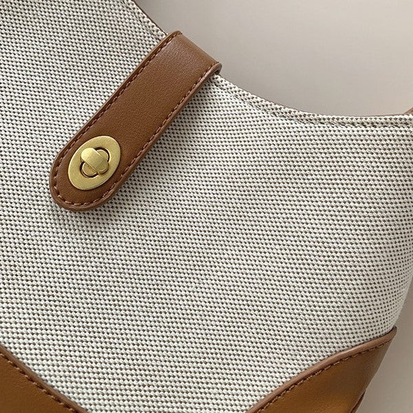 Petit sac à main en toile à fermoir tournant