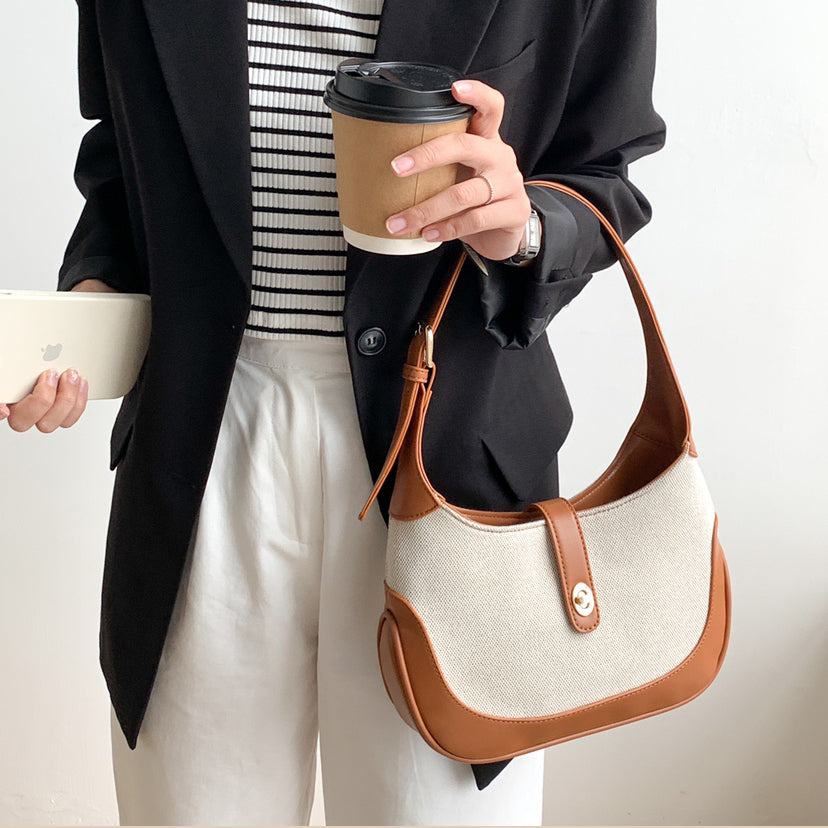 Petit sac à main en toile à fermoir tournant