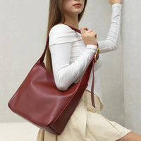 Sac à main épaule en simili cuir lisse avec pochette