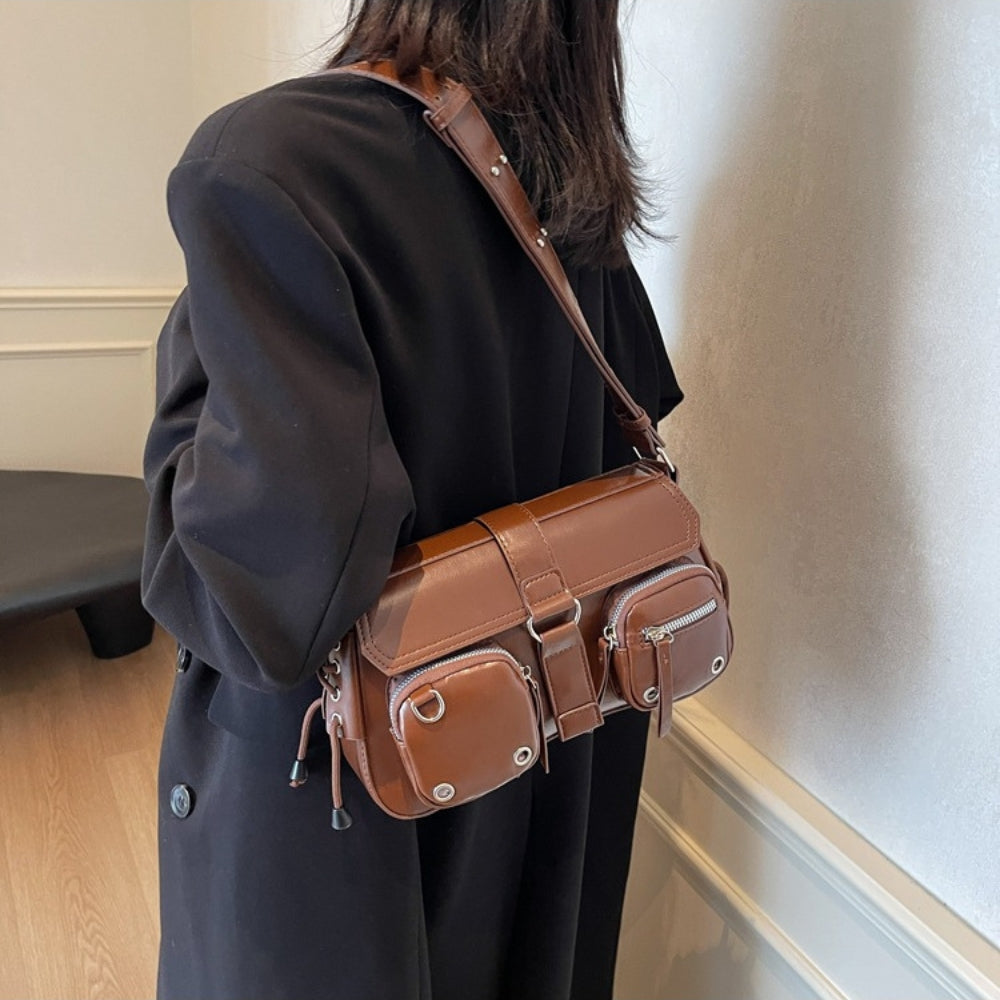 Petit sac bandoulière à rabat et poches zippées