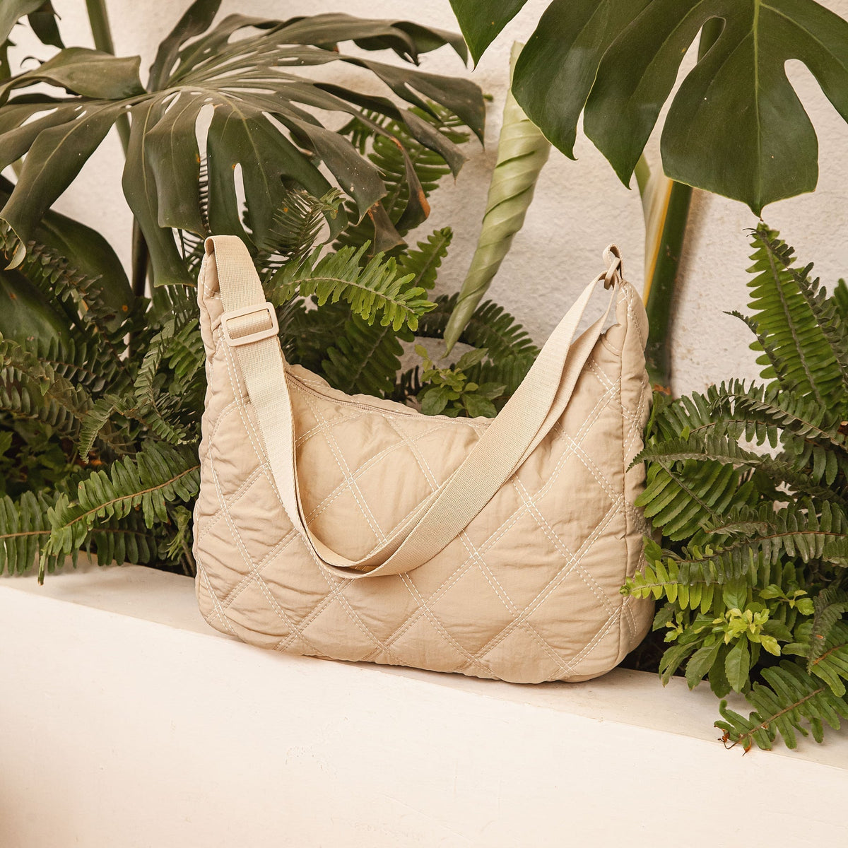 Sac bandoulière matelassé en nylon à motif losange