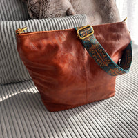 Sac bandoulière en simili cuir à sangle en tissu