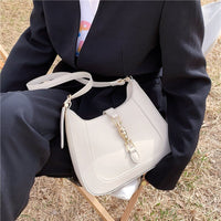 Sac porté épaule vintage à fermoir métallique