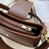 Petit sac bandoulière en simili cuir avec anse courte