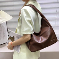 Sac hobo en simili cuir pour ordinateur
