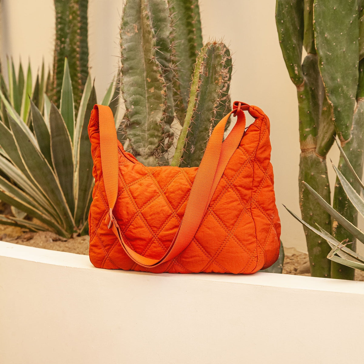 Sac bandoulière matelassé en nylon à motif losange