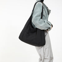Sac cabas rembourré en nylon à bandoulière large