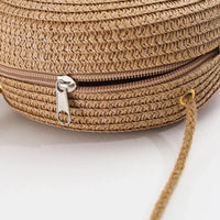 Petit sac rond en paille à bandoulière en corde