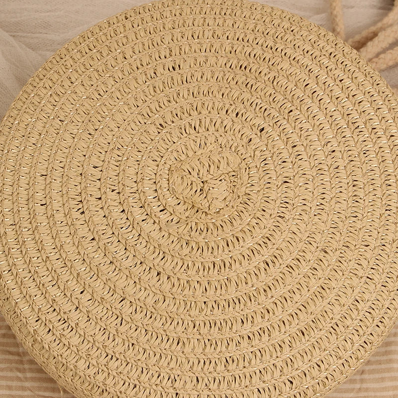 Petit sac rond en paille à bandoulière en corde