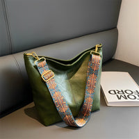 Sac bandoulière en simili cuir à sangle en tissu