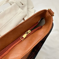 Sac bandoulière en simili cuir à sangle en tissu