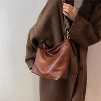 Sac bandoulière en simili cuir à sangle en tissu