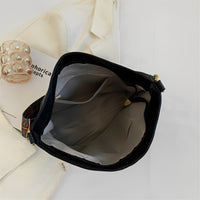 Sac bandoulière en simili cuir à sangle en tissu