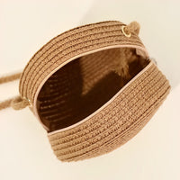 Petit sac rond en paille à bandoulière en corde