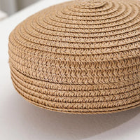 Petit sac rond en paille à bandoulière en corde