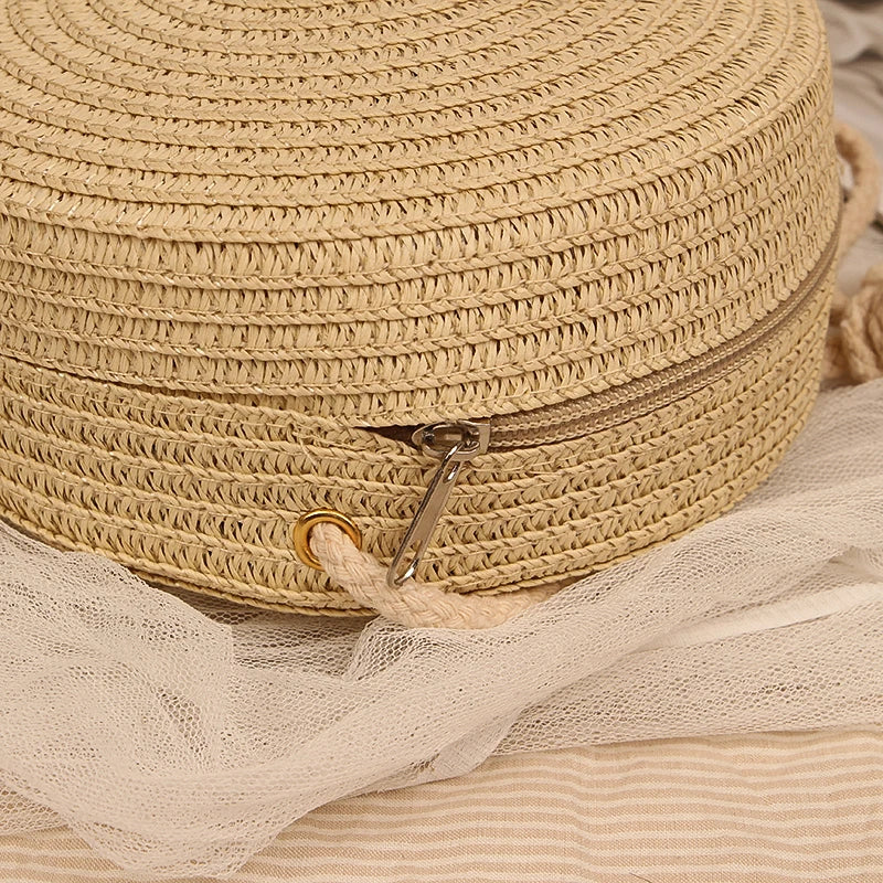 Petit sac rond en paille à bandoulière en corde