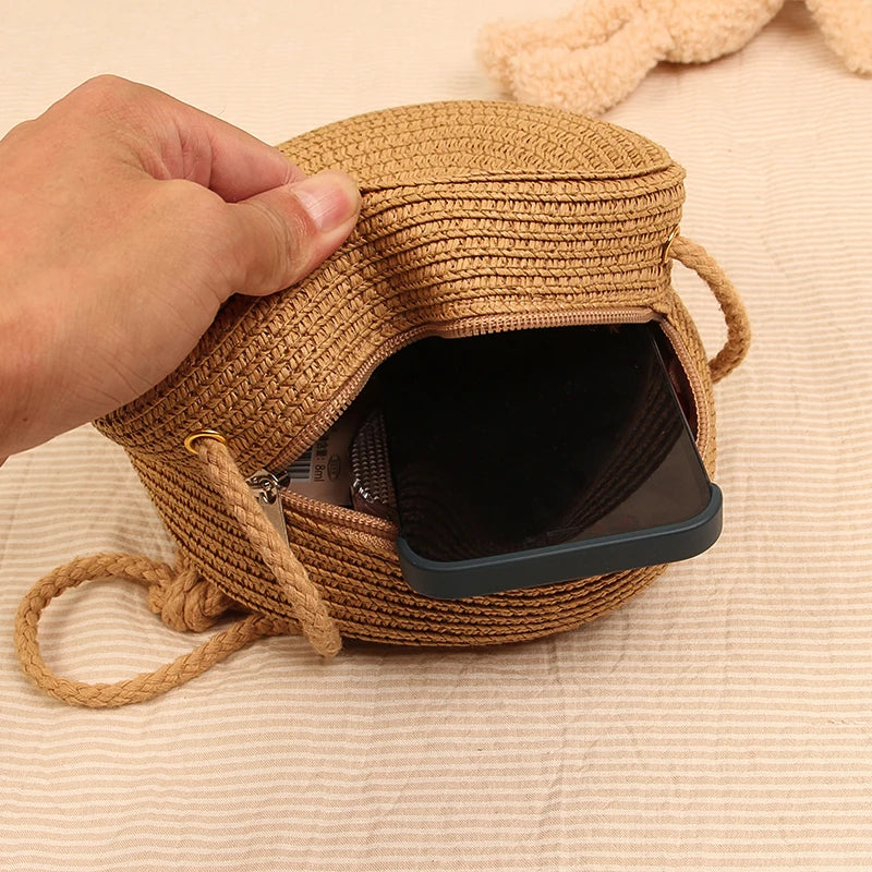 Petit sac rond en paille à bandoulière en corde