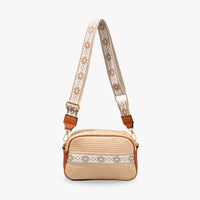 Petit sac bandoulière en paille à sangle brodée