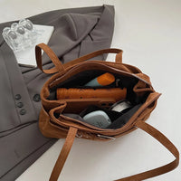 Sac à main en suédine à ceinture décorative