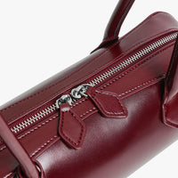 Sac à main allongé en cuir véritable brillant