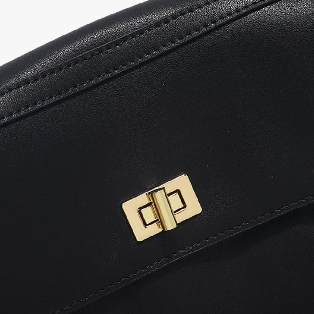 Sac à main en cuir véritable à rabat et fermoir doré