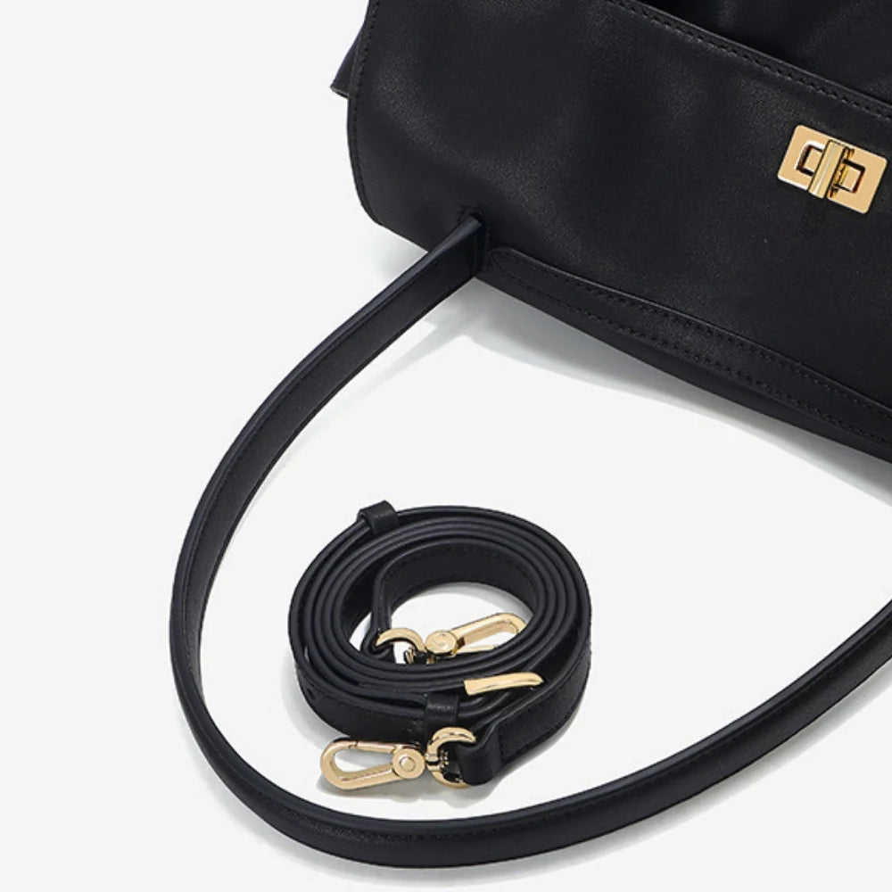 Sac à main en cuir véritable à rabat et fermoir doré