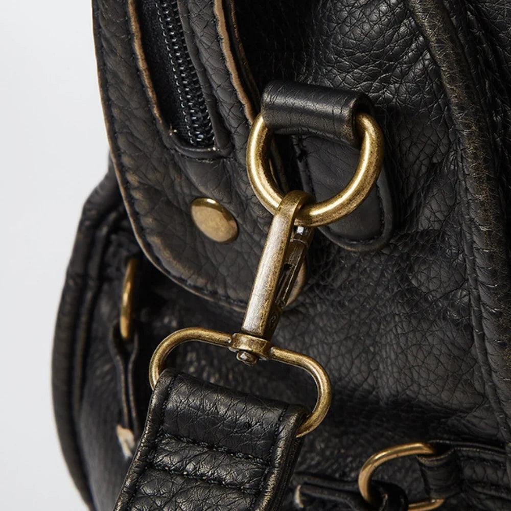 Sac bandoulière en simili cuir grainé à bords bronze