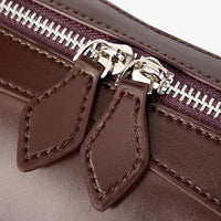 Sac à main allongé en cuir véritable brillant