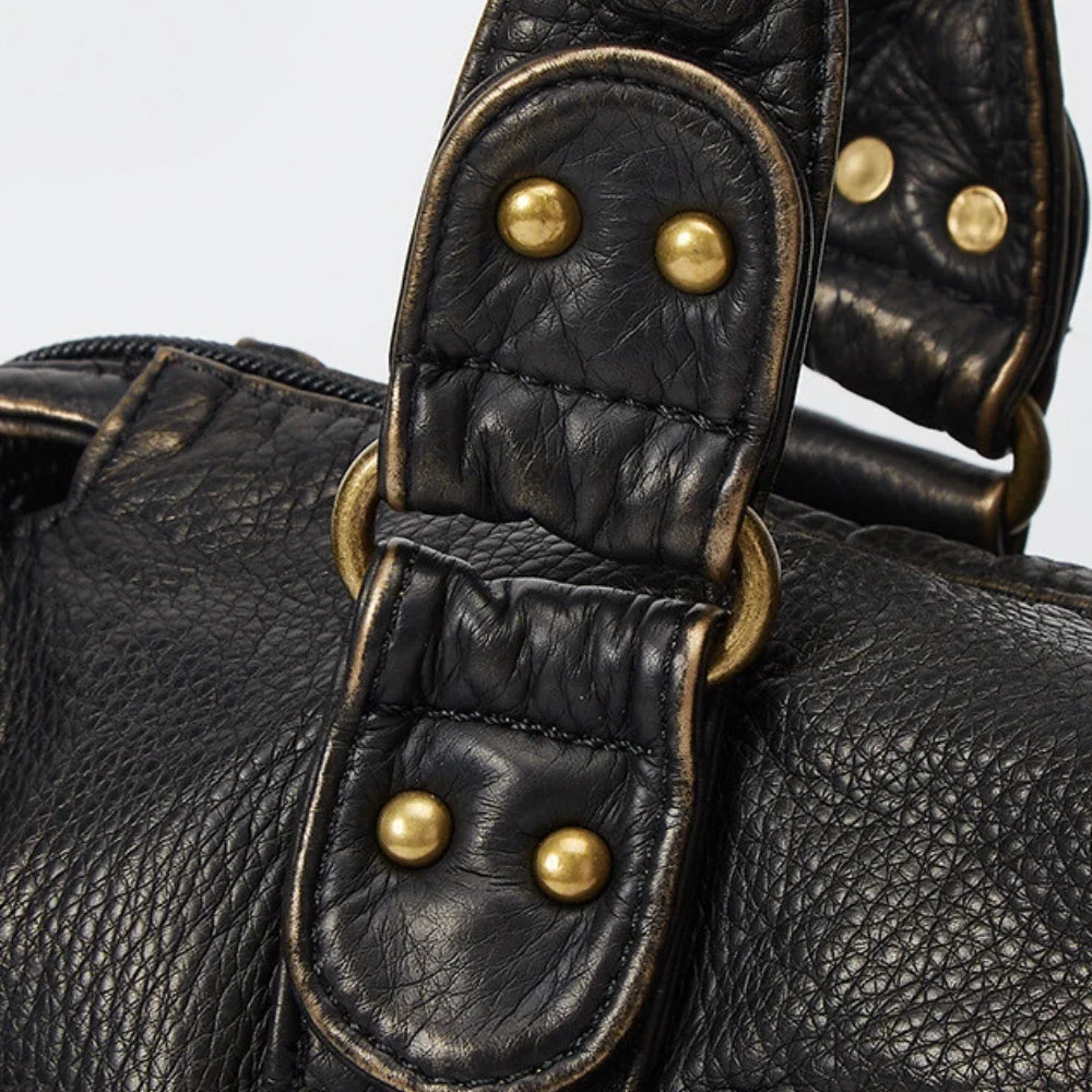 Sac bandoulière en simili cuir grainé à bords bronze