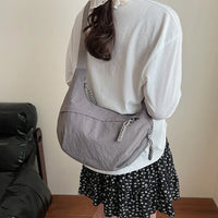 Sac bandoulière plat en nylon déperlant