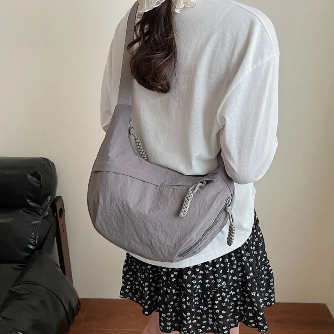 Sac bandoulière plat en nylon déperlant