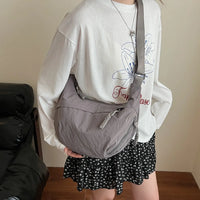 Sac bandoulière plat en nylon déperlant