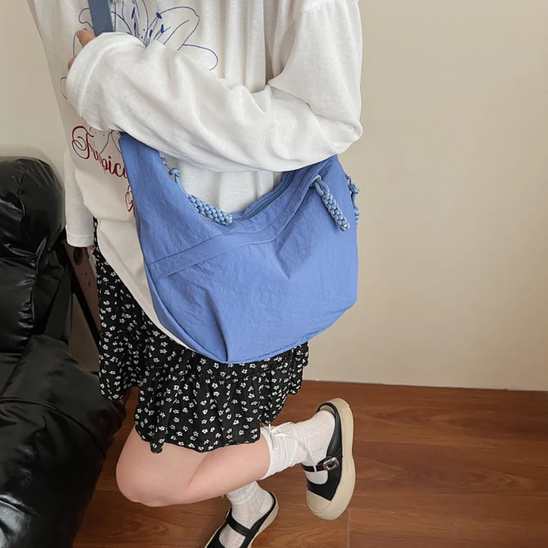 Sac bandoulière plat en nylon déperlant