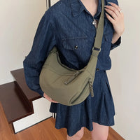 Sac bandoulière plat en nylon déperlant