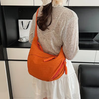 Sac bandoulière plat en nylon déperlant
