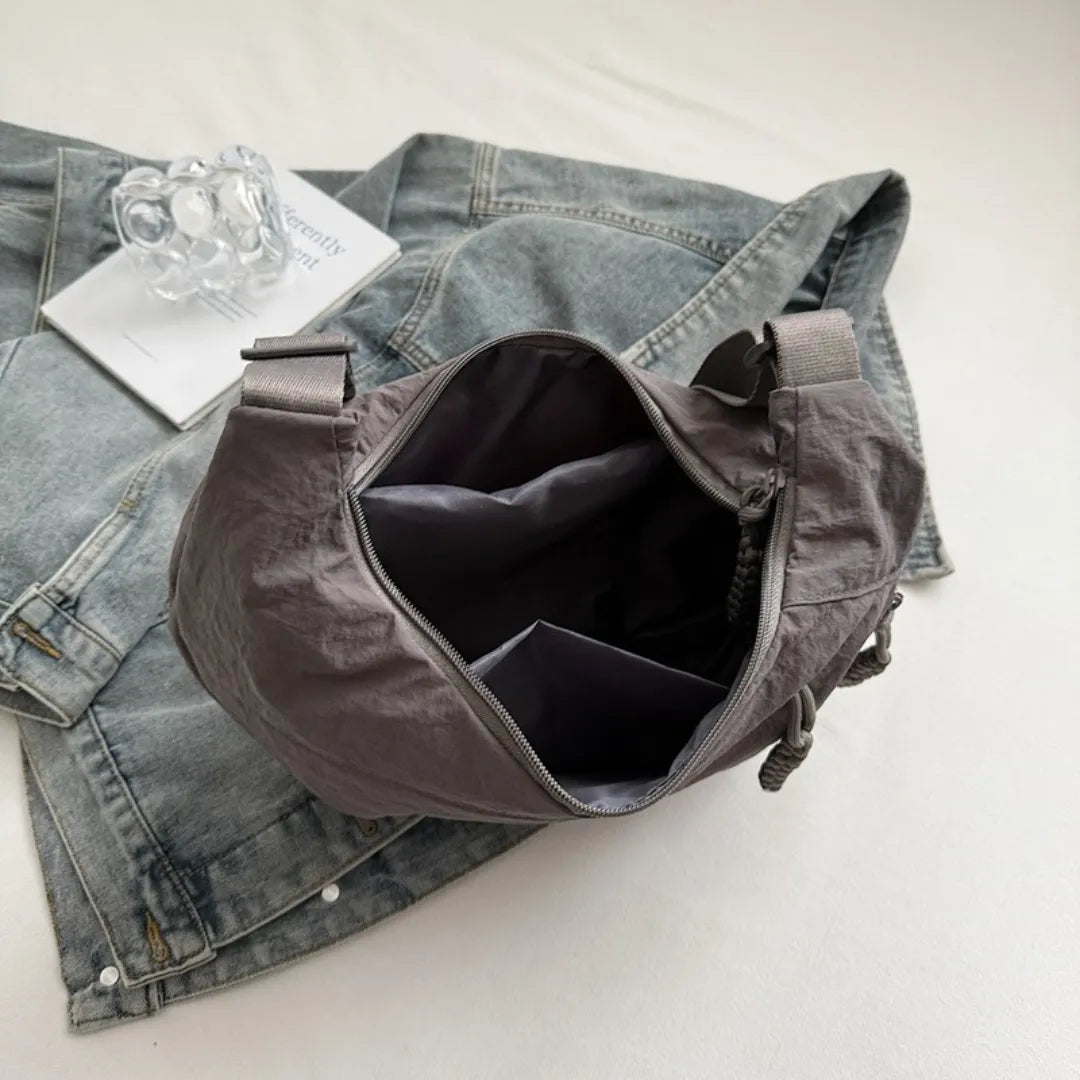 Sac bandoulière plat en nylon déperlant