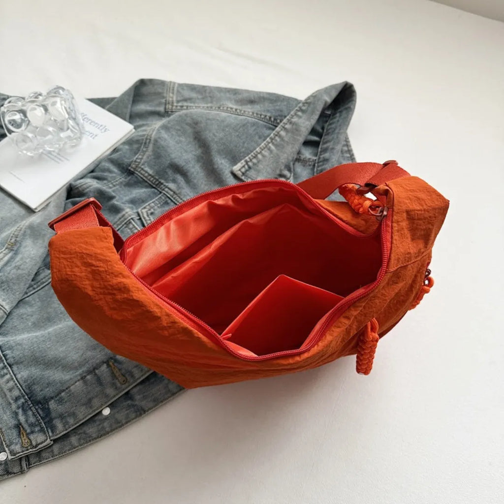 Sac bandoulière plat en nylon déperlant